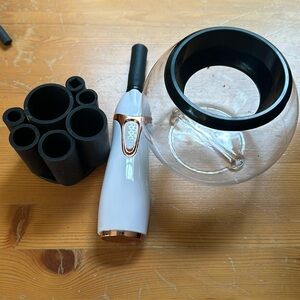 Automatic make up brush cleaner